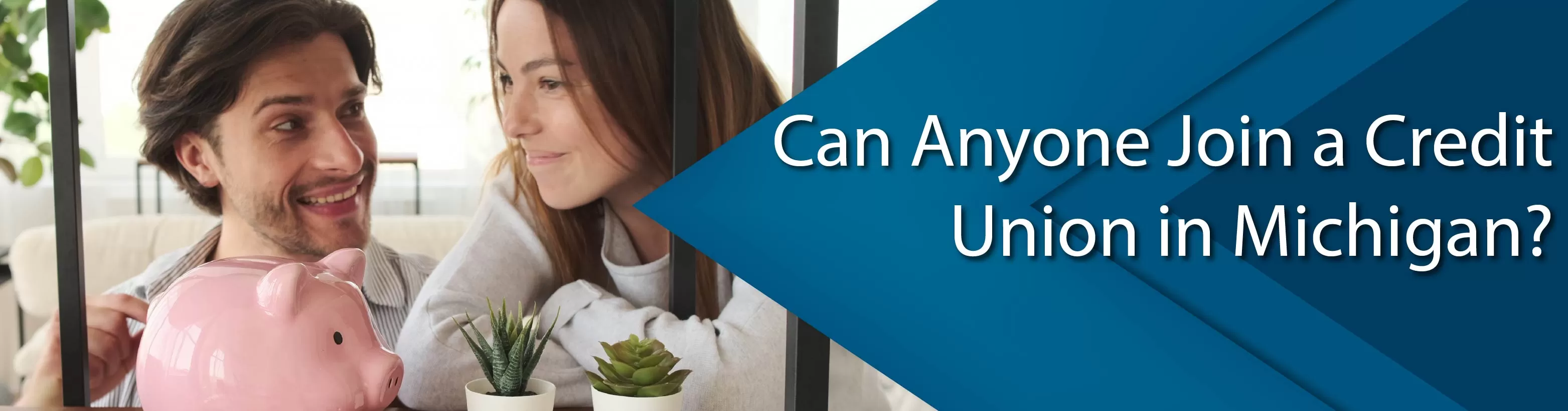 Couple saving up with piggy bank